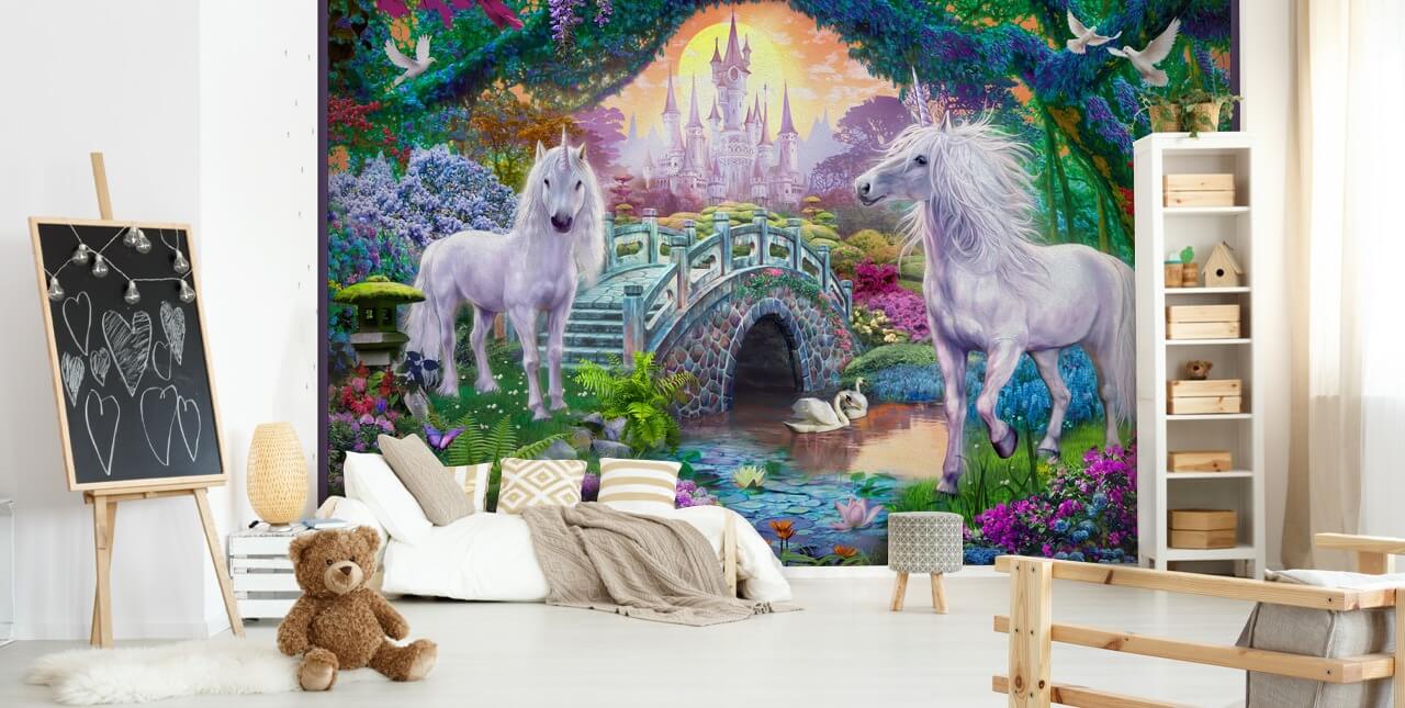 två glödande vita enhörningar i förtrollande färgglada trädgård tapeter