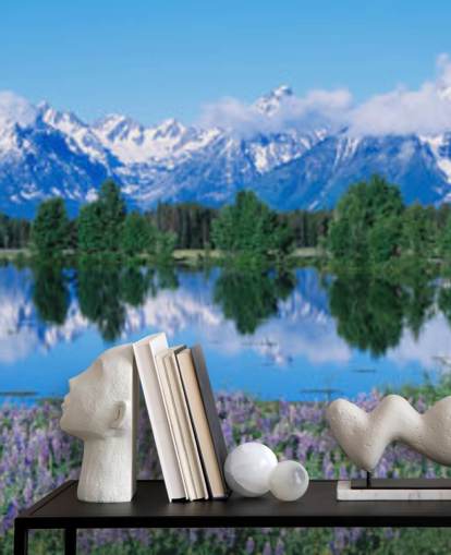 parco nazionale del wyoming con montagne blu e cielo con carta da parati fiori viola parco nazionale del wyoming con montagne blu e cielo con carta da parati fiori viola