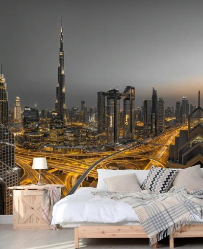 dubai om natten lyser opp med gylden belysning tapet
