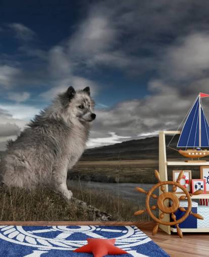 big grey shaggy dog sat by a river wallpaper