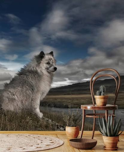 fondo de pantalla de perro peludo grande gris sentado junto a un río
