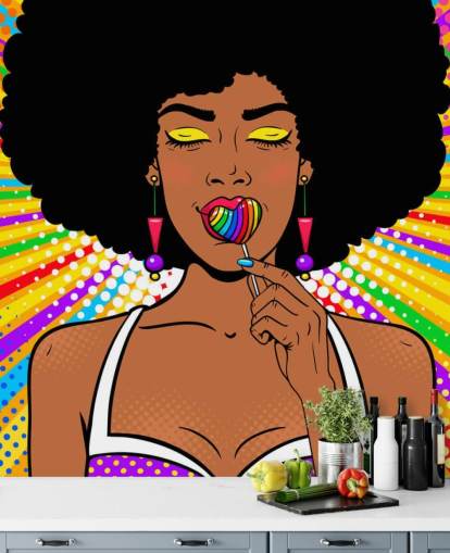 meisje met afrozuigende regenboog hartvormige lolly op regenboogkleurig achtergrondbehang