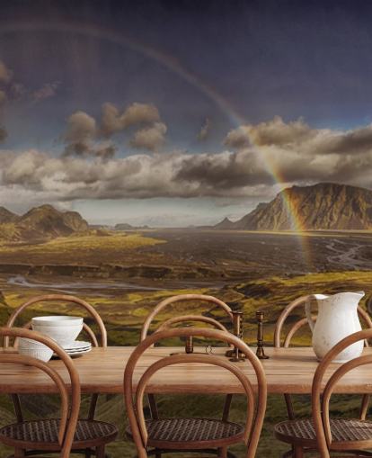 rainbow over hilly landscape wallpaper