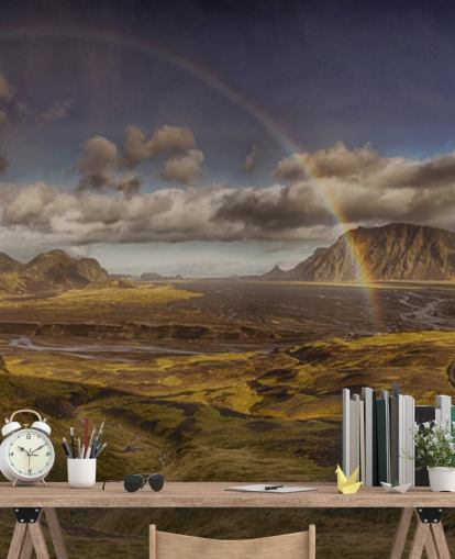 rainbow over hilly landscape wallpaper