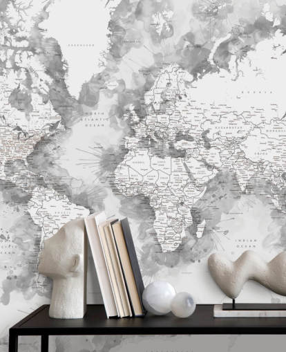 Papier peint carte du monde peinte à l'aquarelle détaillée en gris et blanc