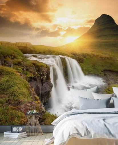 papier peint mural en forme de cascade personnalisable orange et vert appelé Icelandic Waterfall Sunset pour les spas, les chambres et les salles de bains