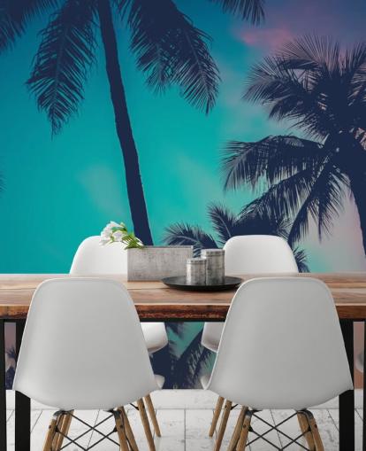 black palm tree silhouettes against blue, pink and orange skies wallpaper