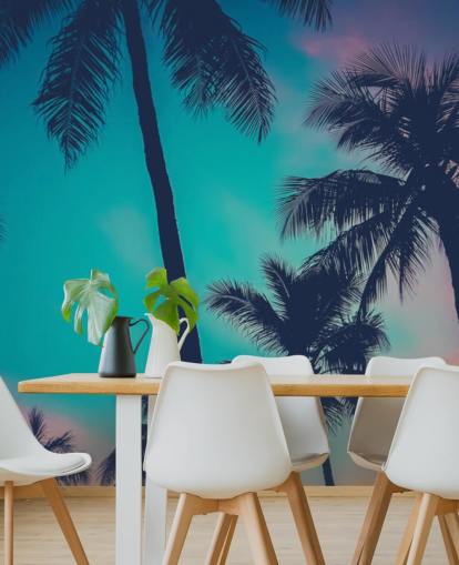 black palm tree silhouettes against blue, pink and orange skies wallpaper