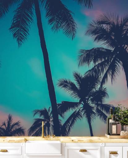 black palm tree silhouettes against blue, pink and orange skies wallpaper
