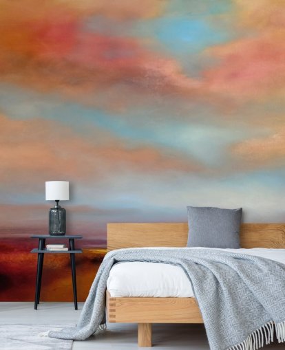 orange and red clouds amongst blue sky over pink heathland painting wallpaper
