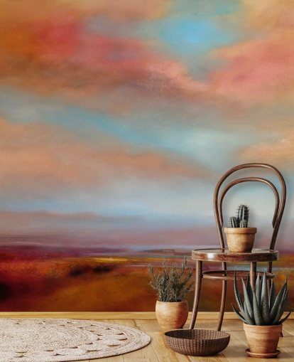 orange and red clouds amongst blue sky over pink heathland painting wallpaper
