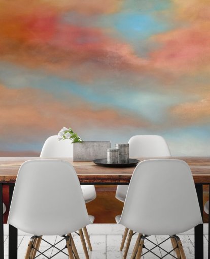 orange and red clouds amongst blue sky over pink heathland painting wallpaper