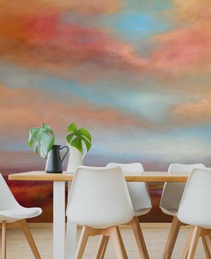 orange and red clouds amongst blue sky over pink heathland painting wallpaper