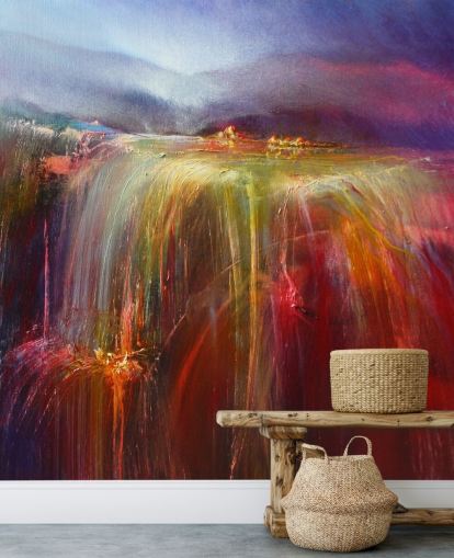 abstract painting of overflowing colour in reds, oranges, pinks, purples wallpaper