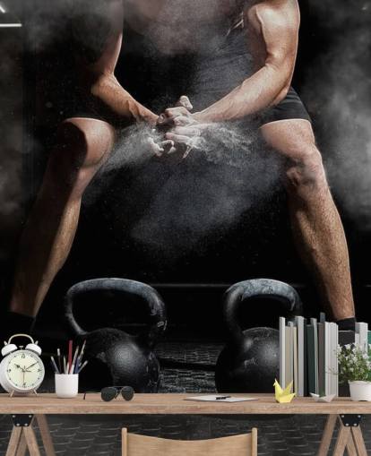 man putting chalk on hands before lifting weights wallpaper