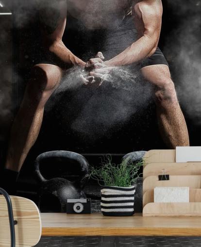 man putting chalk on hands before lifting weights wallpaper