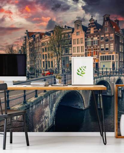 amsterdam brug en huizen bij zonsondergang behang