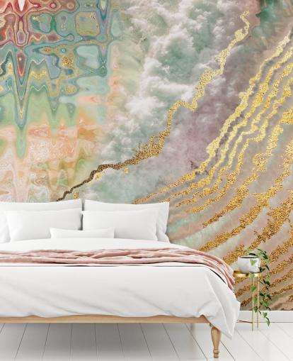 gold colour geode with pink, purple and green shades wallpaper