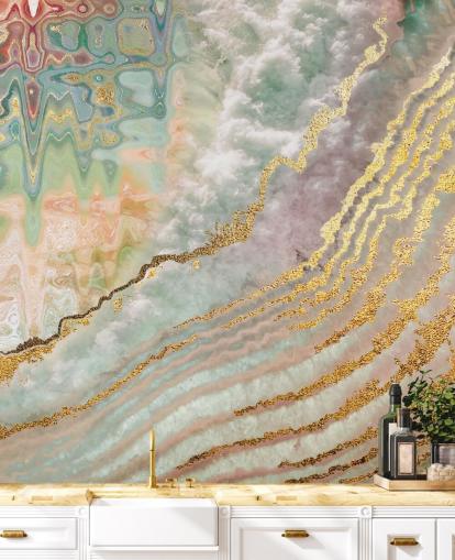 gold colour geode with pink, purple and green shades wallpaper