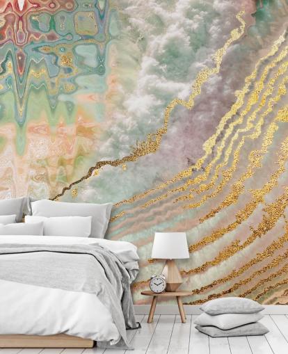 gold colour geode with pink, purple and green shades wallpaper