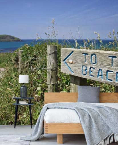 Schild zum Strand-Tapete
