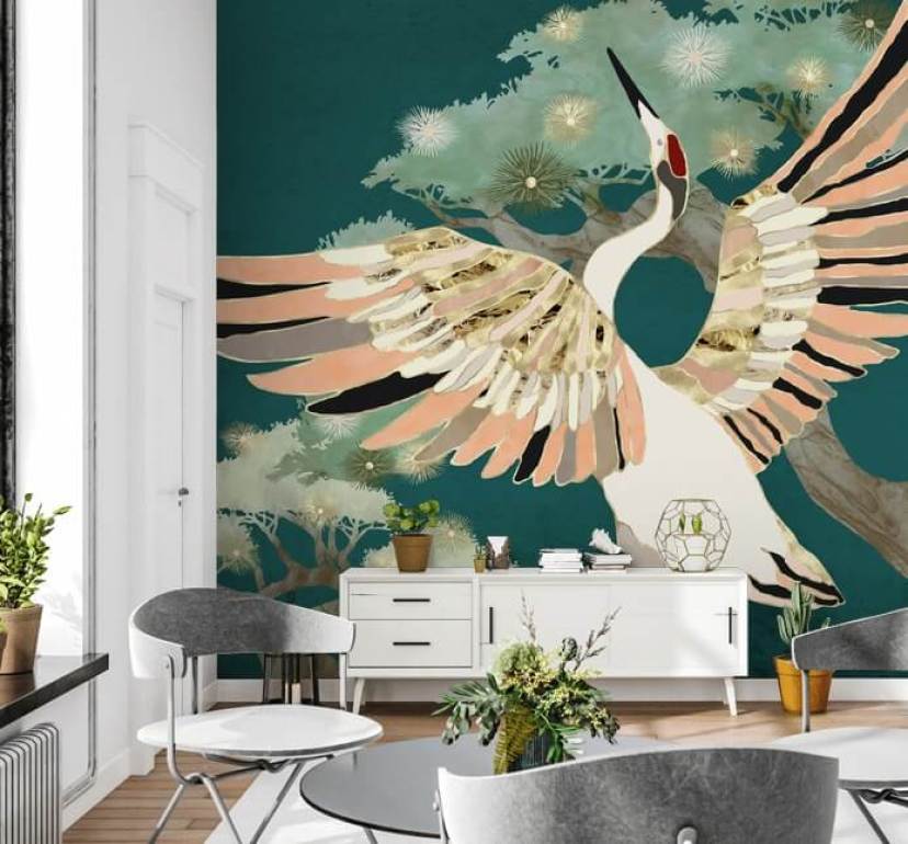 green background with oriental trees and white crane with pink and gold coloured wings wallpaper