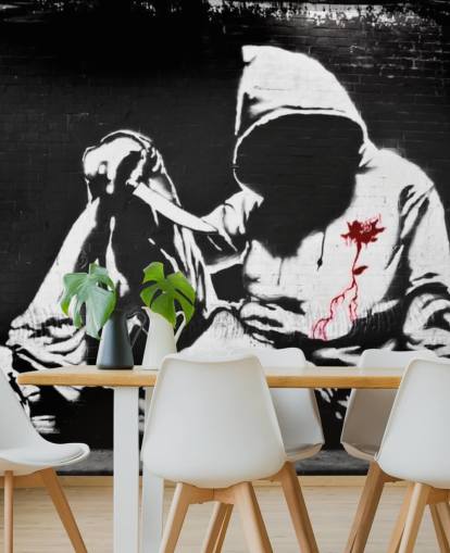Mural Grafiti con capucha y cuchillo de Banksy