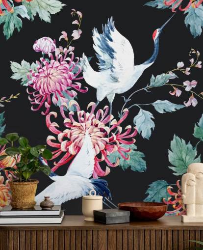 white japanese cranes and dark floral wallpaper