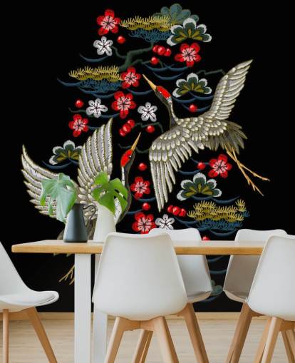 geborduurd paar kranen en bloemen op zwart achtergrondbehang