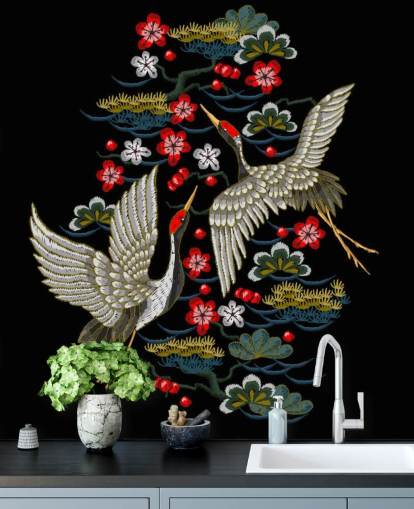 embroidered pair of cranes and flowers on black background wallpaper