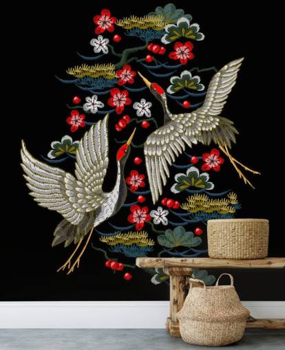 embroidered pair of cranes and flowers on black background wallpaper
