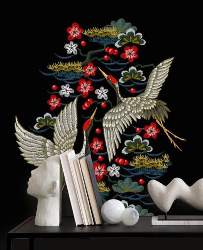 embroidered pair of cranes and flowers on black background wallpaper