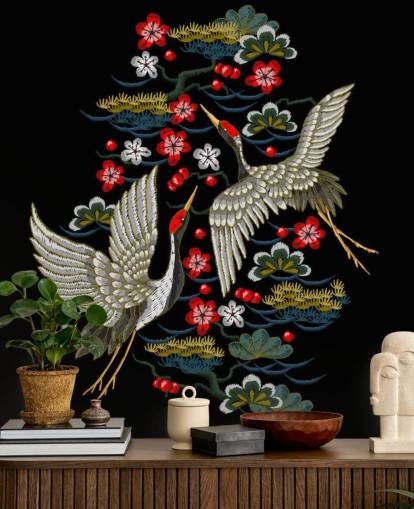 embroidered pair of cranes and flowers on black background wallpaper