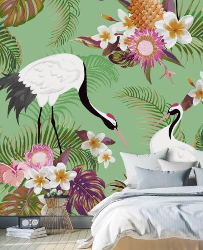 dos grullas con follaje tropical y papel tapiz de fondo verde