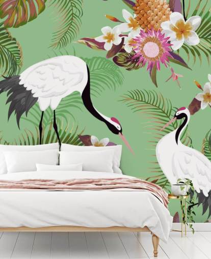 dos grullas con follaje tropical y papel tapiz de fondo verde