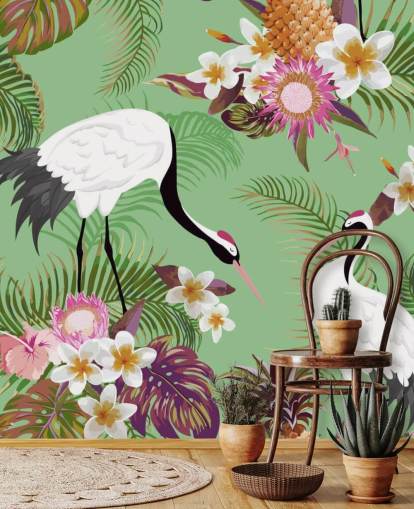 dos grullas con follaje tropical y papel tapiz de fondo verde