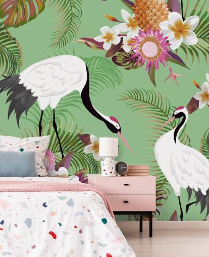 two cranes with tropical foliage and green background wallpaper