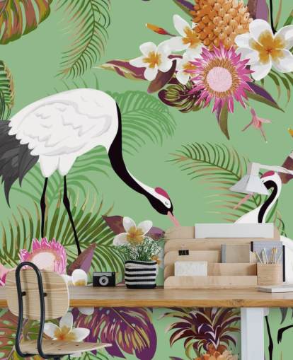 dos grullas con follaje tropical y papel tapiz de fondo verde
