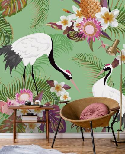 dos grullas con follaje tropical y papel tapiz de fondo verde