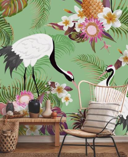 dos grullas con follaje tropical y papel tapiz de fondo verde