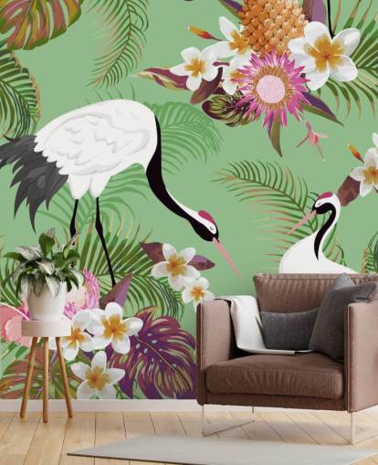 dos grullas con follaje tropical y papel tapiz de fondo verde