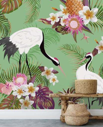 dos grullas con follaje tropical y papel tapiz de fondo verde