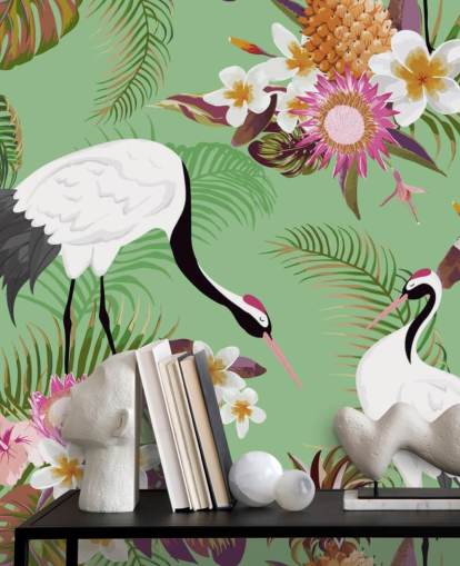 dos grullas con follaje tropical y papel tapiz de fondo verde