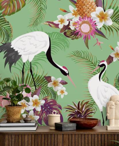two cranes with tropical foliage and green background wallpaper