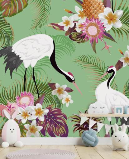 dois guindastes com folhagem tropical e papel de parede de fundo verde