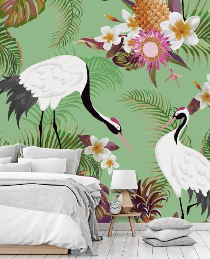 dos grullas con follaje tropical y papel tapiz de fondo verde