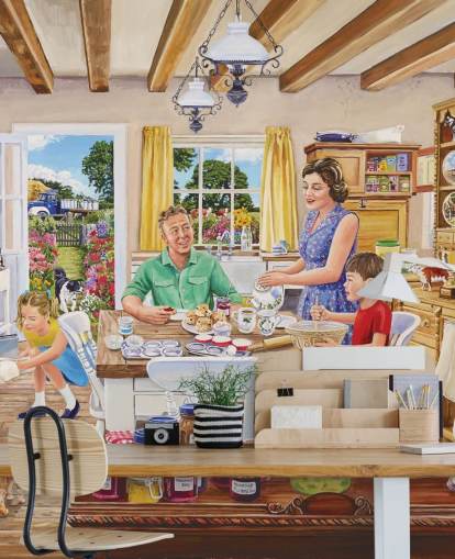 farmhouse kitchen with range, cat, cakes and family wallpaper