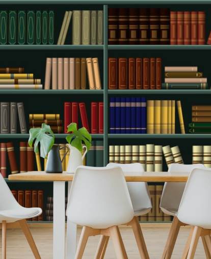 livres jaunes, rouges et verts sur papier peint étagère verte