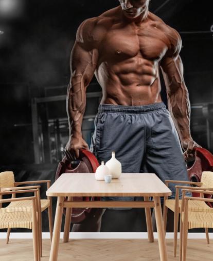 strong bodybuilder man holding weights wallpaper