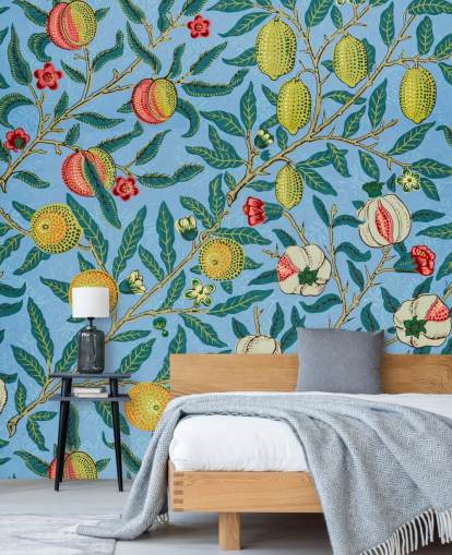fond bleu vif avec des pêches, des citrons et des grenades papier peint